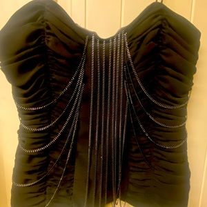 Black spaghetti strips corset top with chains across the front. Never worn.